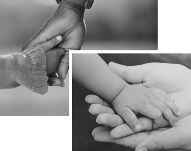 child holding hands with parent